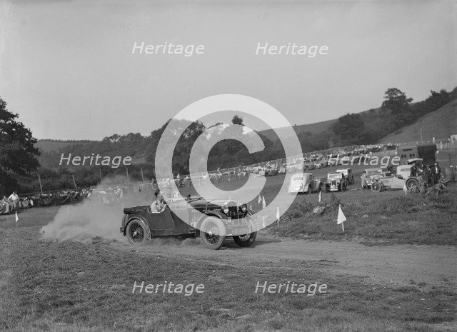 Wolseley Hornet McEvoy Special competing in the MG Car Club Rushmere Hillclimb, Shropshire, 1935. Artist: Bill Brunell.