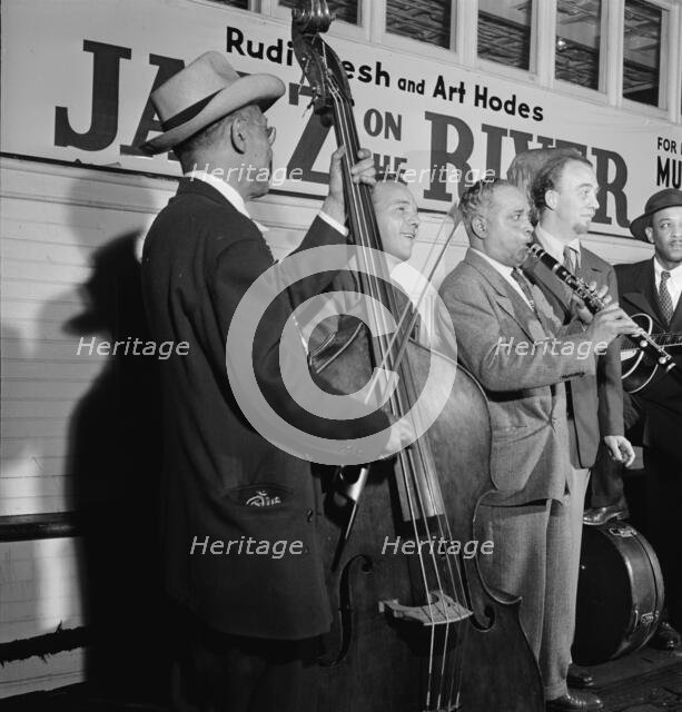 Portrait of Albert Nicholas and Rudi Blesh, Riverboat on the Hudson, N.Y., ca. July 1947. Creator: William Paul Gottlieb.