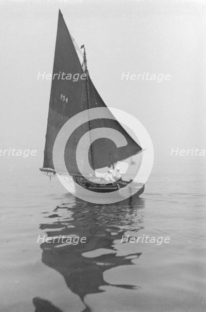 Fishing Smack under sail, 1911. Creator: Kirk & Sons of Cowes.