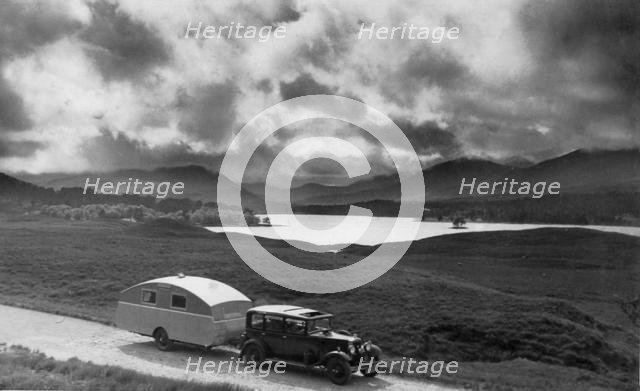 1930 Morris Oxford Six with Winchester Streamline caravan. Creator: Unknown.