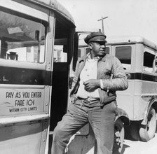 Negro buses waiting for passengers, Daytona Beach, Florida, 1943. Creator: Gordon Parks.