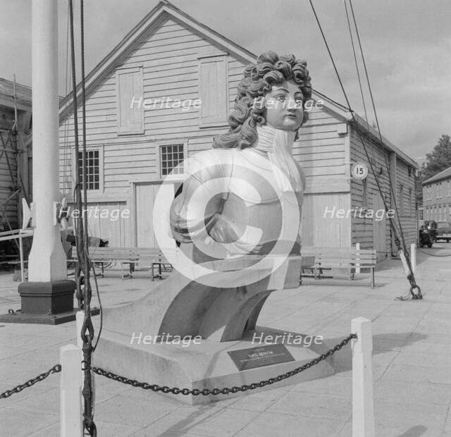 General view of a figurehead from HMS Benbow, Portsmouth Naval Dockyard, 1956. Creator: Eric de Maré.