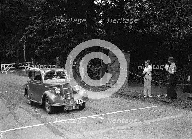 G Kinsey-Morgan's Ford Model C Ten, winner of a silver award at the MCC Torquay Rally, July 1937. Artist: Bill Brunell.