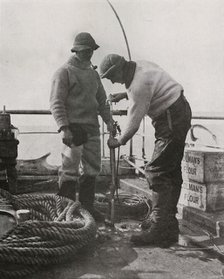 'Dr. Wilson and Dr. Atkinson Loading The Harpoon Gun', c1910–1913, (1913). Artist: Herbert Ponting.