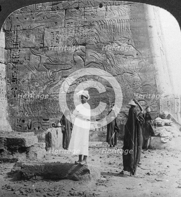'The hunting of the wild bull, carved on a tempkle wall at Medinet Habu, Thebes, Egypt', 1905.Artist: Underwood & Underwood
