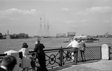 People watching traffic on the Thames, Greenwich, London, c1945-c1965. Artist: SW Rawlings
