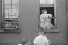 Children playing in the street, 61st Street between 1st and 3rd Avenues, New York, 1938. Creator: Walker Evans.