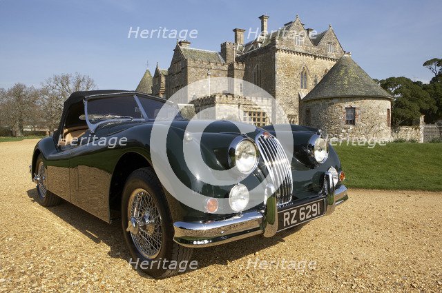 1954 Jaguar XK140 outside Palace House, Beaulieu Artist: Unknown.