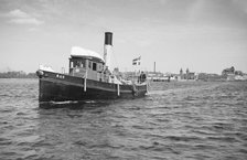 The tugboat 'Ran' leaving Landskrona, harbour, Sweden, 1935. Artist: Unknown