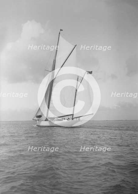 The yawl 'White Heather I' sailing close-hauled, 1911. Creator: Kirk & Sons of Cowes.