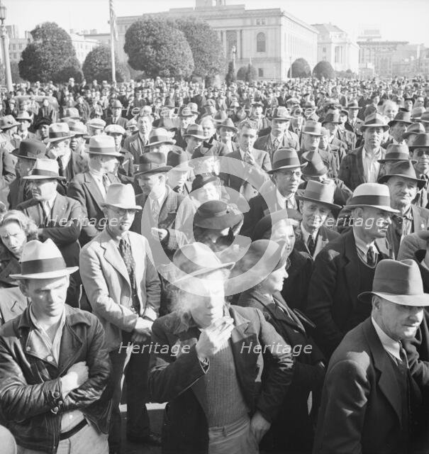 Listening to speeches at mass meeting of WPA workers protesting..., San Francisco, California, 1939. Creator: Dorothea Lange.