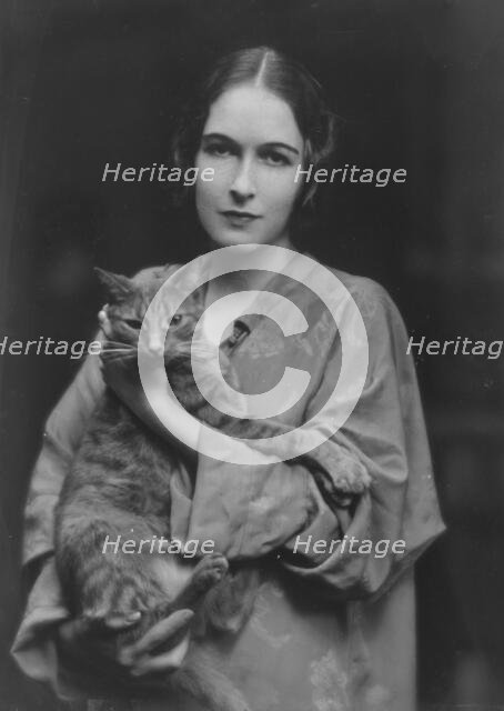 Pujo, Mona, Miss, with Buzzer the cat, portrait photograph, 1916. Creator: Arnold Genthe.