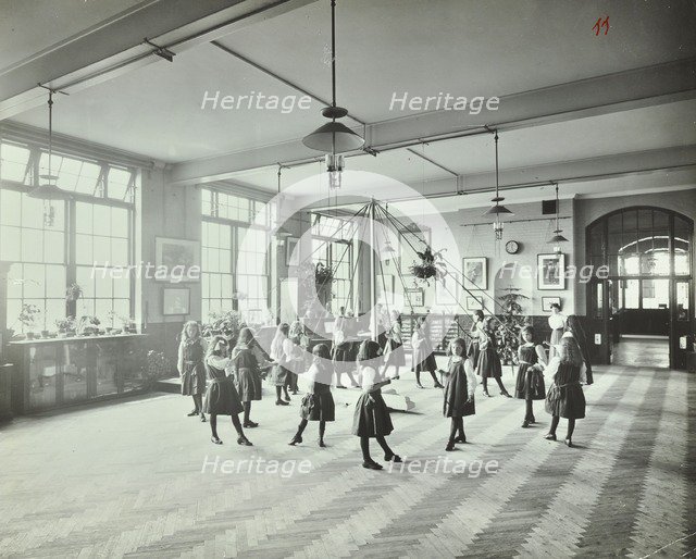 Girls dancing around a maypole, Hugon Road School, Fulham, London, 1907. Artist: Unknown.