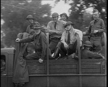 US Army Trucks and Cars Lining the Road, 1932. Creator: British Pathe Ltd.