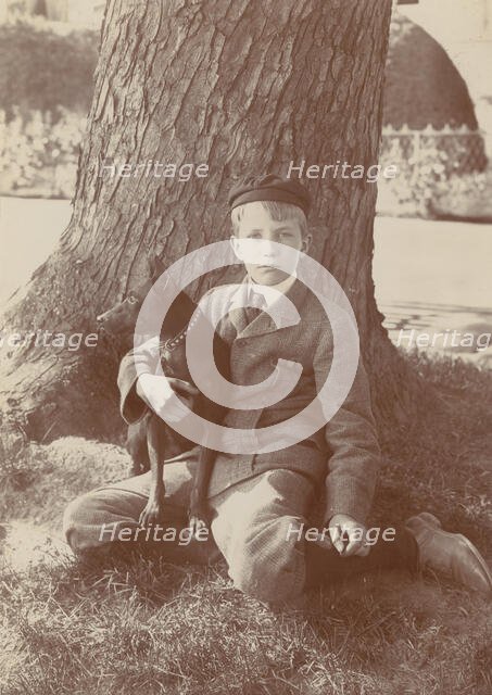 Kermit Roosevelt and Jack, the dog, 1902. Creator: Frances Benjamin Johnston.
