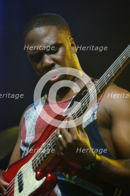 Derrick Hodge, Love Supreme Jazz Festival, Glynde Place, East Sussex, 2014. Artist: Brian O'Connor.