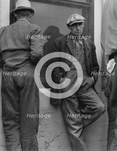 Waiting for the semimonthly relief checks at Calipatria, Imperial Valley, California, 1937. Creator: Dorothea Lange.