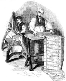 Preparing punched cards for a Jacquard loom, 1844. Artist: Unknown