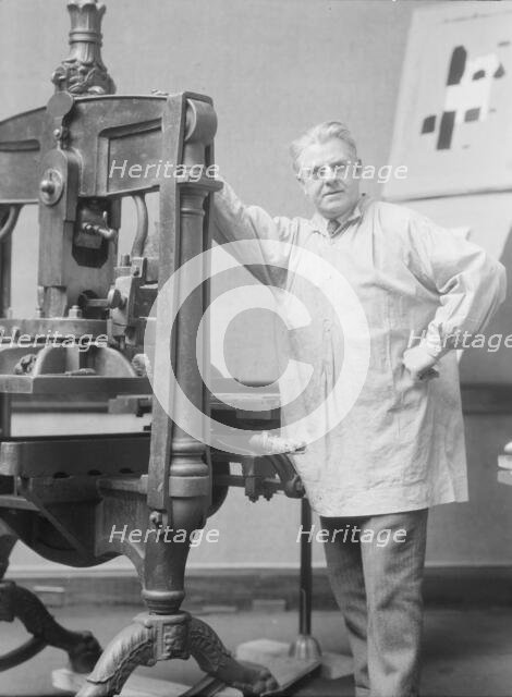 Goudy, Frederick, Mr., at his printing press, 1924 Mar. 15. Creator: Arnold Genthe.