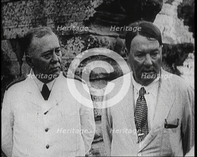 Publisher Alfred Harmsworth, 1st Viscount Northcliffe, Talking to Another Man by a Ruin, 1922. Creator: British Pathe Ltd.