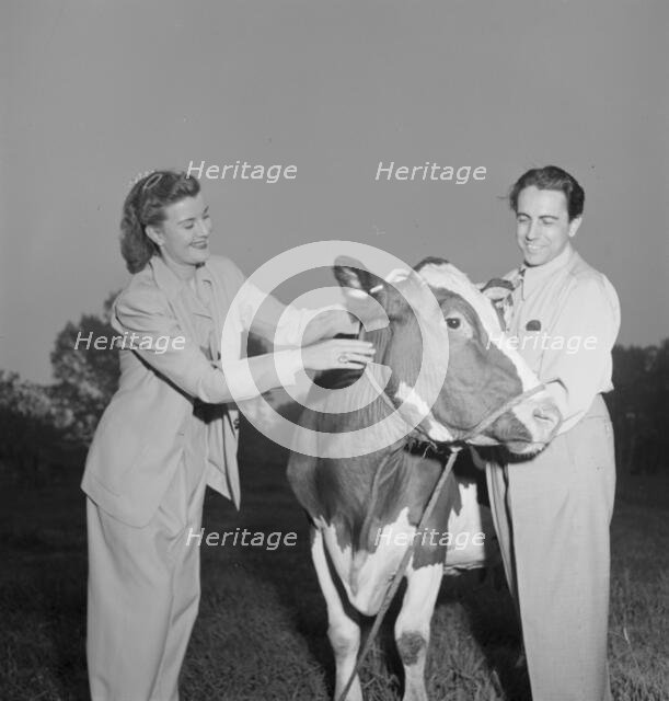 Portrait of Enric Madriguera and Patricia Gilmore on their farm, Connecticut, ca. June 1947. Creator: William Paul Gottlieb.