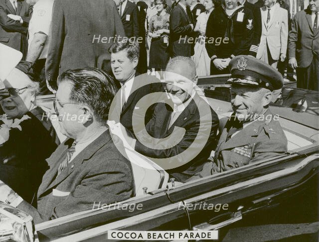 President John F. Kennedy, John Glenn and General Davis in Cocoa Beach Parade, 1962.  Creator: NASA.