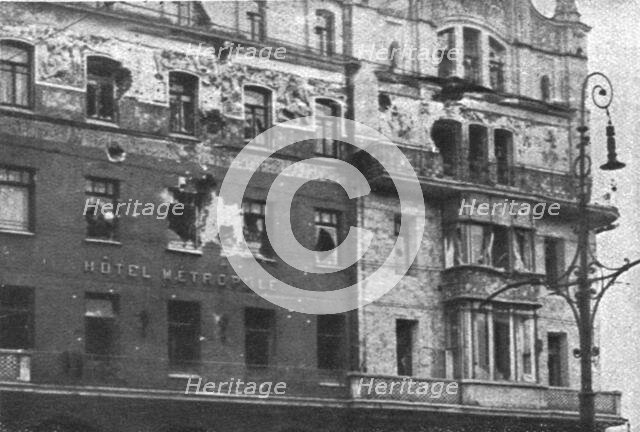 In Soviet Russia; Facade of the Hotel Metropole, in Moscow, cannoned and rifled...1917. Creator: Unknown.