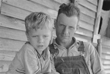 Charles and his father Floyd Burroughs, Alabama cotton sharecropper, 1936. Creator: Walker Evans.