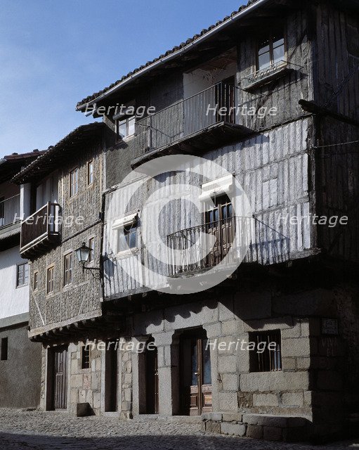 Street of La Alberca (Salamanca), and a house façade.