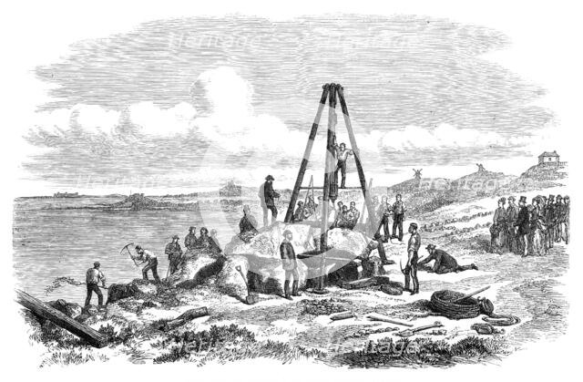 Raising the west capstone of Le Trepied Cromlech, Guernsey, 1870. Creator: Unknown.