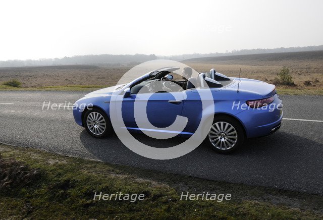 2006 Alfa Romeo Spyder driving in New Forest. Artist: Unknown.