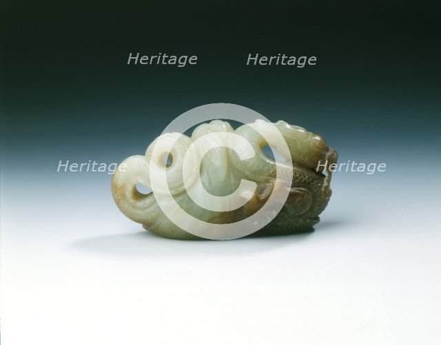 Jade five-clawed dragon with feathered tail in cloth wrapping, late Ming dynasty, China, 1550-1644. Artist: Unknown