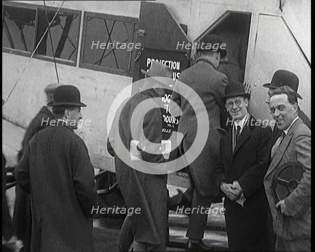 A Group of Passengers Embarking Upon a Plane, 1920s. Creator: British Pathe Ltd.