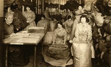 Sorting uniforms at the WAAC clothing store, First World War, 1914-1918, (1933).  Creator: Unknown.