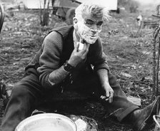 Gypsy man shaving, 1960s.