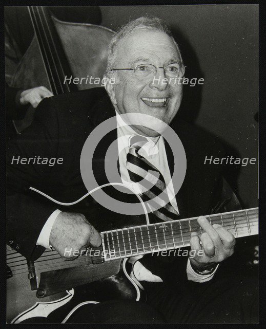 American guitarist Bucky Pizzarelli at The Fairway, Welwyn Garden City, Hertfordshire, 2000. Artist: Denis Williams