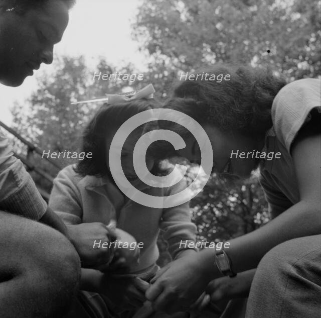 Campers helping with the kitchen work at Camp Ellen Marvin, Arden, New York, 1943. Creator: Gordon Parks.