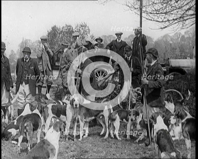 Badger Hunt. Huntsmen Gathering for Photographs With Their Dogs, 1921. Creator: British Pathe Ltd.