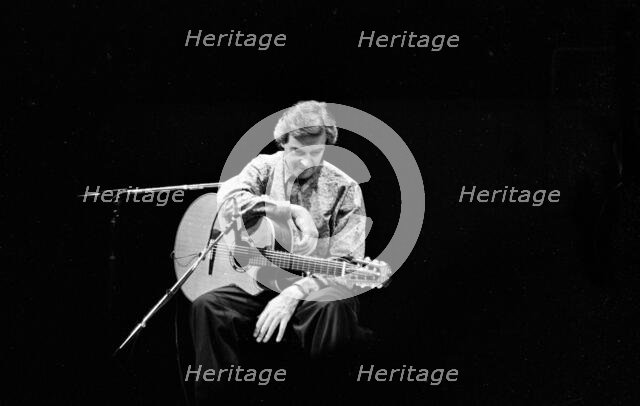 John McLaughlin, Fairfield Halls, Croydon, London, 1987. Creator: Brian O'Connor.