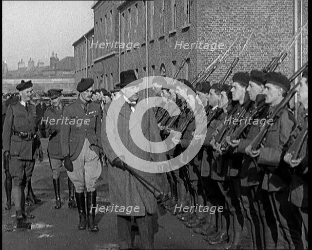 A British Man Inspecting Lines of Irish Auxiliary Soldiers, 1921. Creator: British Pathe Ltd.