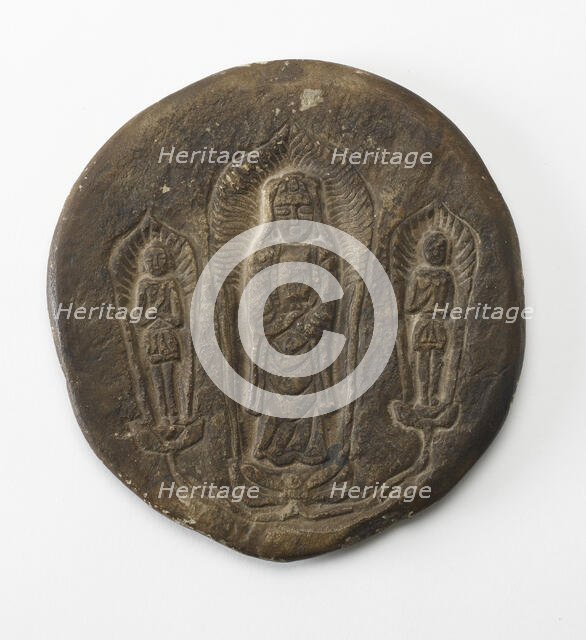Circular plaque with Buddhist trinity on obverse..., Period of Division, Dated 500 CE. Creator: Unknown.