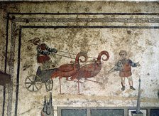 Mosaic with the representation of a chariot drawn by birds.