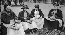 Pea shelling in Covent Garden, London, 1926-1927. Artist: Unknown