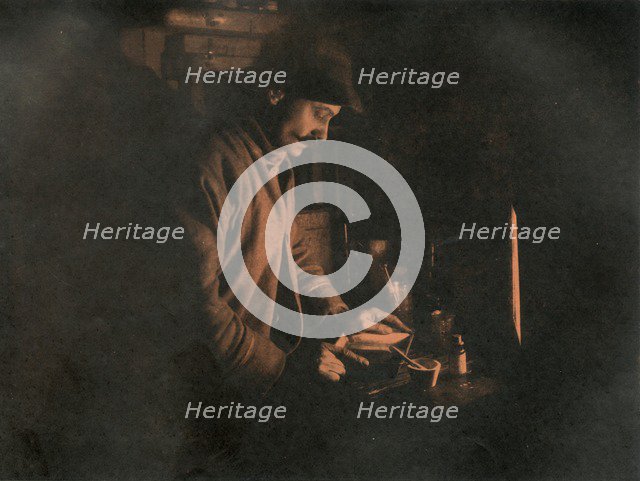 'Ponting Developing a Plate in the Dark Room', c1910–1913, (1913).  Artist: Unknown.