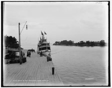 New Island Wanderer approaching wharf at the Frontenac, Round Island, N.Y., between 1890 and 1901. Creator: Unknown.