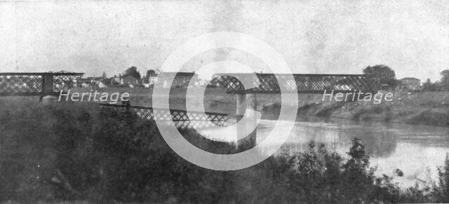 The Dark Hours of Italy; A bridge over the Livenza, which the Italians blew up.., 1917. Creator: Unknown.