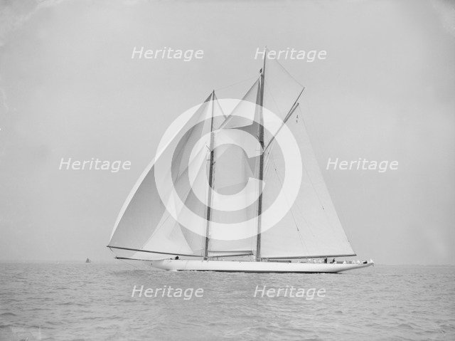 The 380 ton A Class schooner 'Margherita' sailing under spinnaker, 1913. Creator: Kirk & Sons of Cowes.