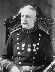 Maj. W. F. Tucker, seated, in uniform, 1915. Creator: Bain News Service.