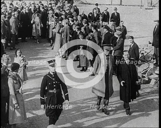 Albert I, King of the Belgians and Elizabeth, Her Majesty the Queen of the Belgians Walking...1930s. Creator: British Pathe Ltd.
