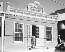 Small town shop front, Louisiana, 1936. Creator: Walker Evans.